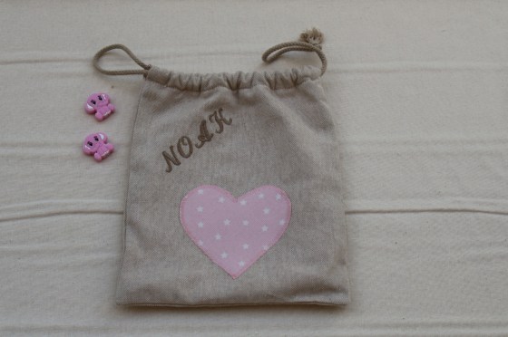 Bolsa pequeña de ropa con aplicación